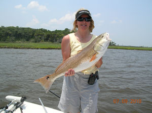 a happy fisherman with daytona's captian barry